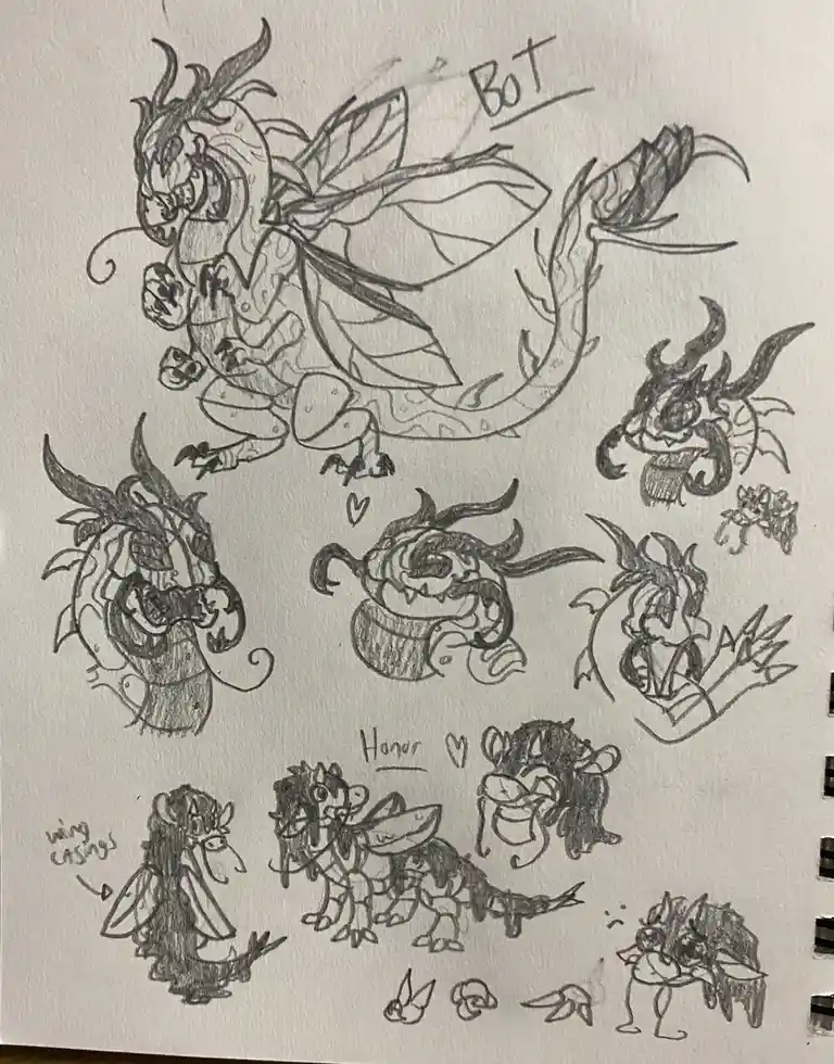 A pencil sketch on paper shows multiple cartoonish dragon designs, including a large one labeled 'Bot' at the top, several…