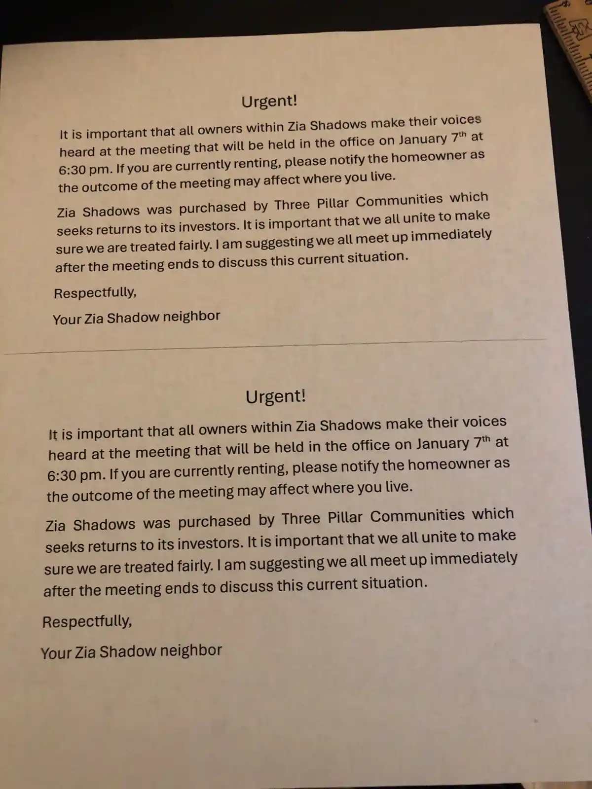 A printed notice titled 'Urgent!' is shown twice on a single sheet of paper, urging residents of Zia Shadows to attend a…