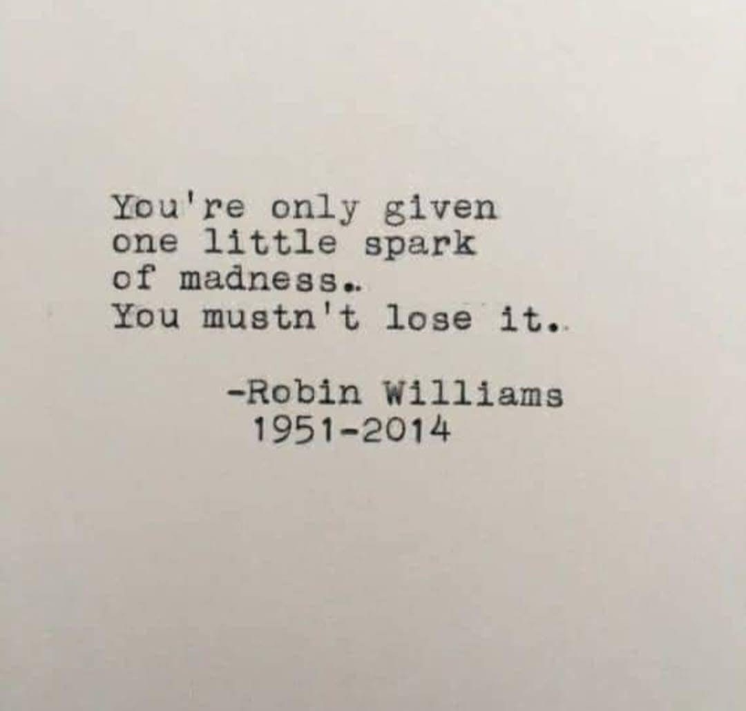 The image displays typewritten text on plain white paper. The text reads: 'You're only given one little spark of madness…