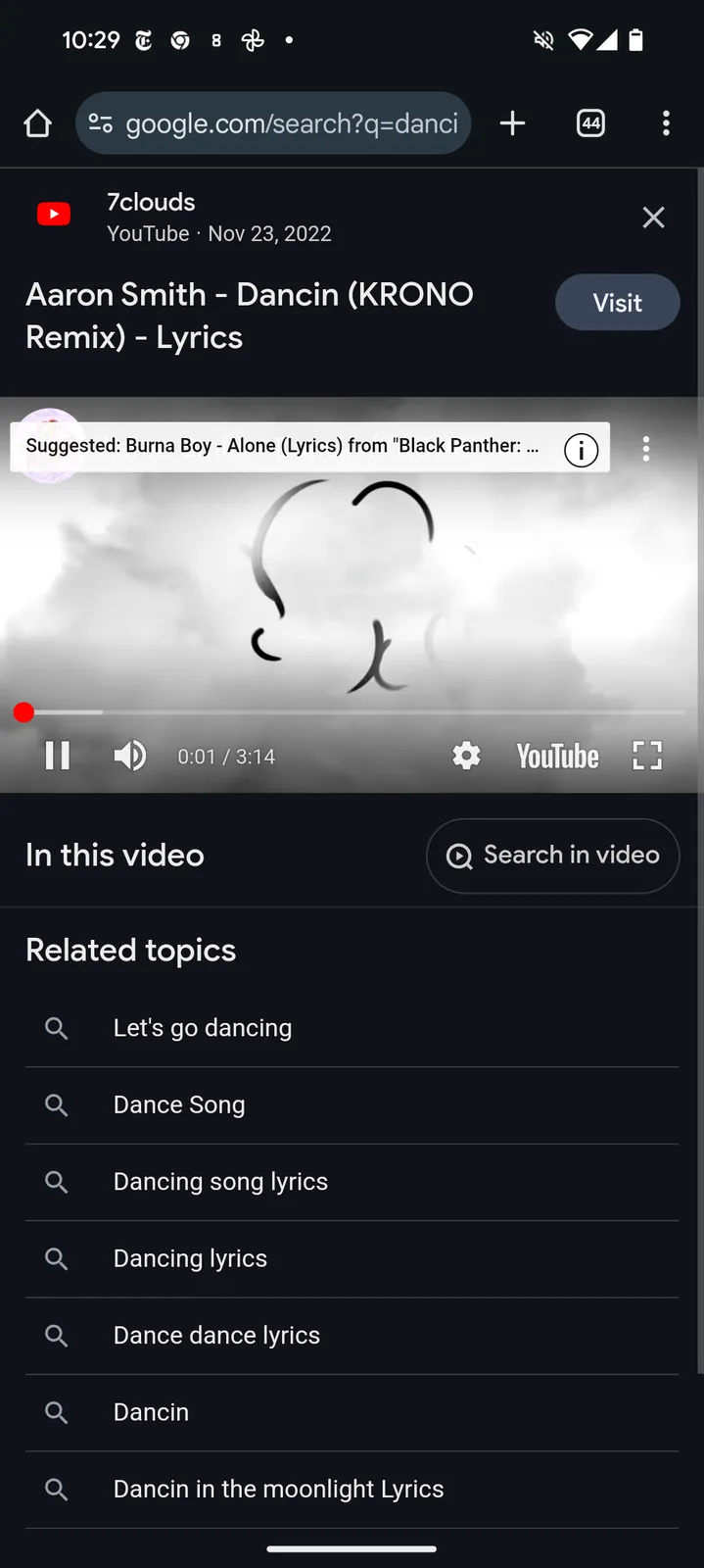 A smartphone screenshot shows a YouTube video playing 'Aaron Smith - Dancin (KRONO Remix) - Lyrics' with a black-and-white…