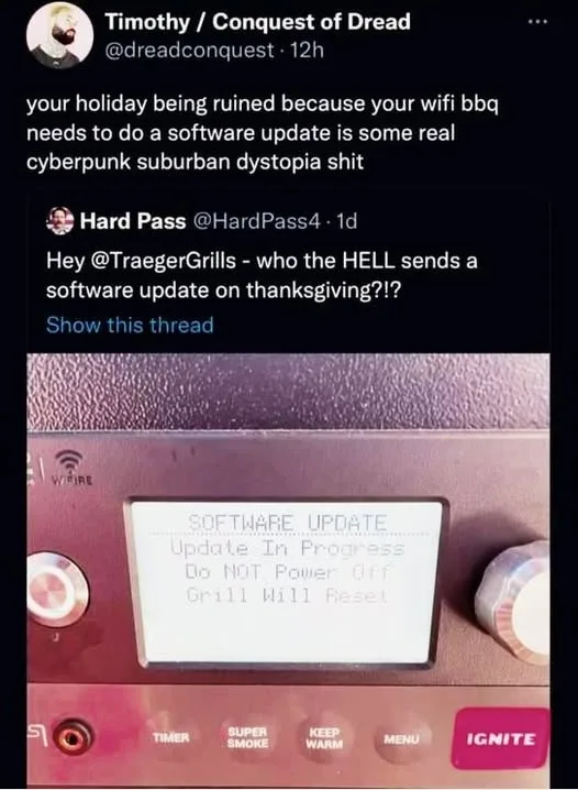 A close-up photo of a smart grill's digital display showing a software update message that says 'SOFTWARE UPDATE, Update In…