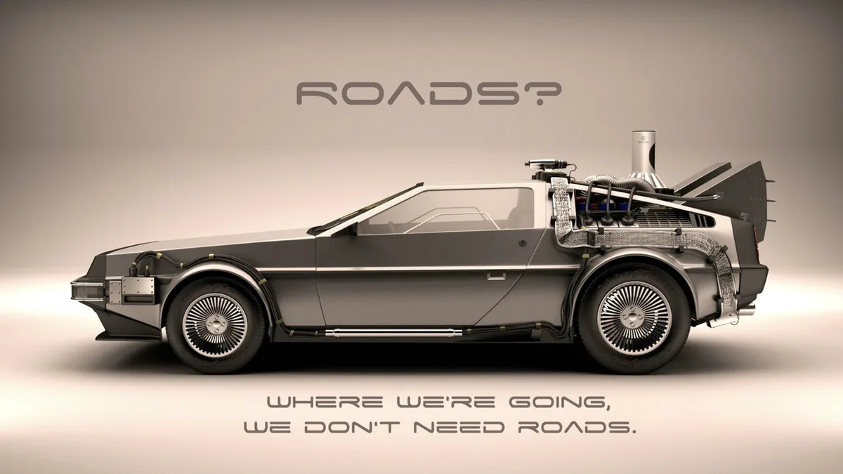 A silver DeLorean with exposed mechanical components and wires is shown in profile against a plain background. The text…
