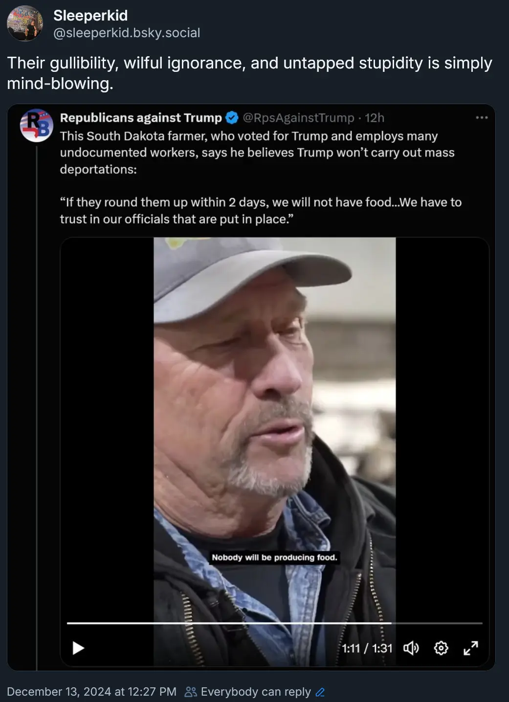 A screenshot of a social media post showing a video clip of a middle-aged man in a cap and jacket, with a subtitle overlaid…