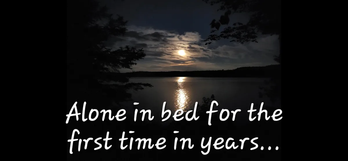 A serene night scene shows a full moon shining over a calm lake, with tree silhouettes framing the view. White cursive text…