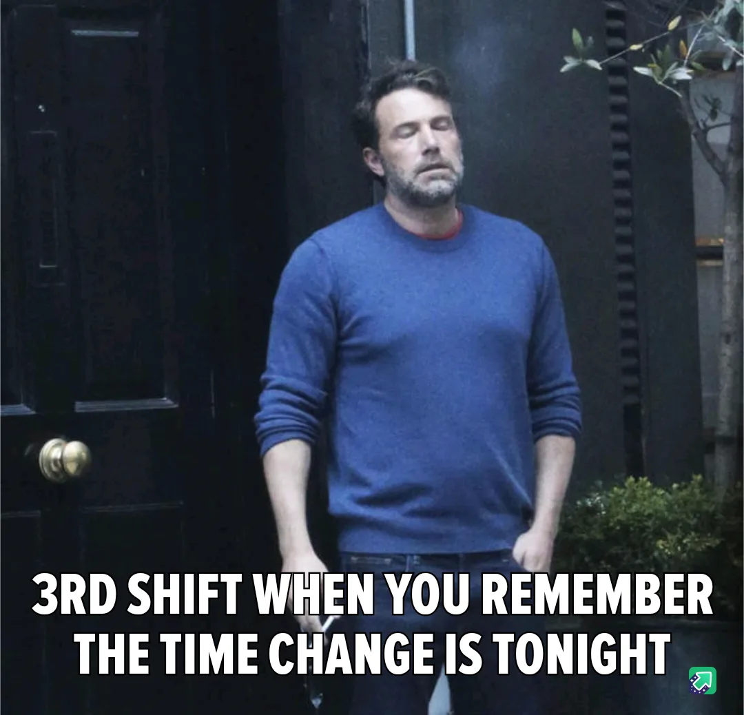 A man in a blue sweater stands outside a dark door with a weary, exhausted expression, eyes half-closed. The overlaid text…