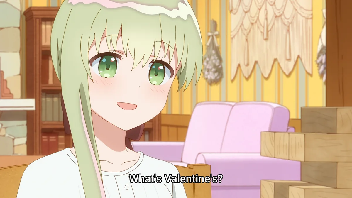 An anime girl with light green hair and green eyes looks confused and innocent, with a pink frosting-like substance on her…