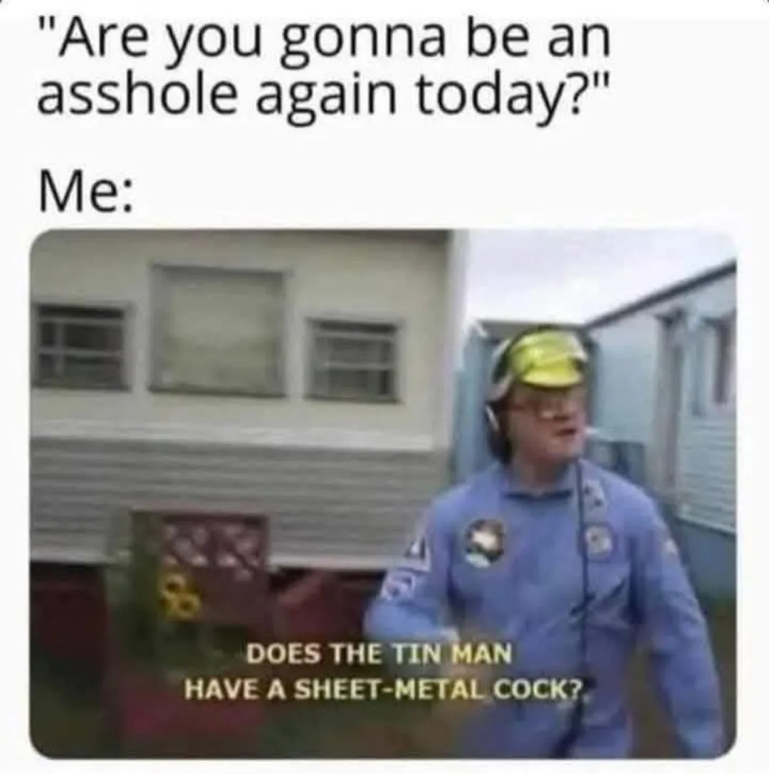 A man in a blue work uniform and yellow safety hat stands outdoors in front of a house, looking upward with a confused or…
