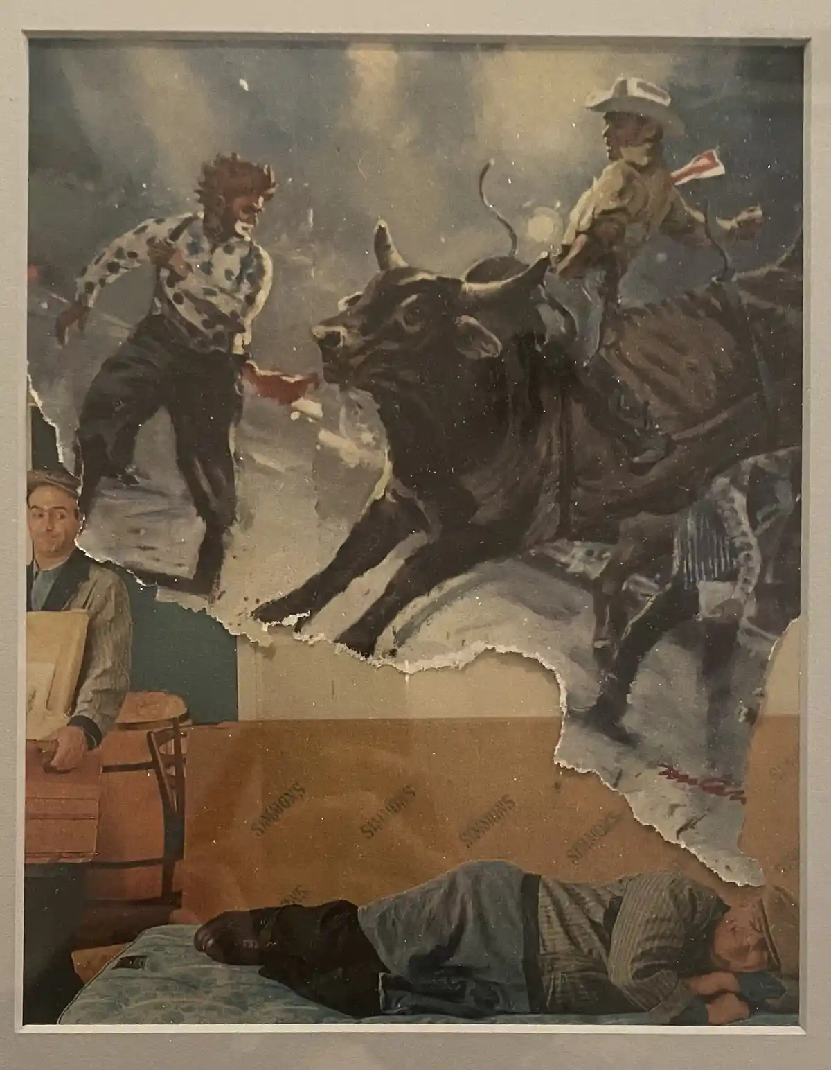 A torn poster depicting a chaotic rodeo scene with a bull, a cowboy, and a clown is pasted on a wall. Below the torn poster…