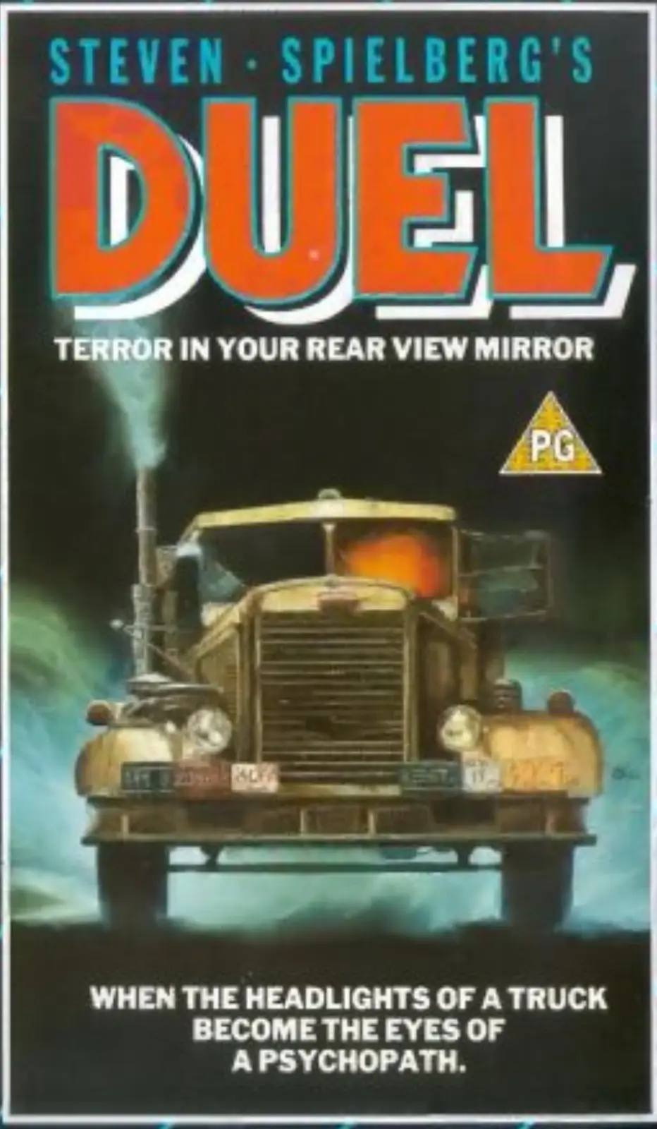 The image is a VHS cover for Steven Spielberg's 1971 film 'Duel,' featuring a menacing, vintage yellow truck with glowing…