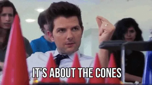 The image displays six identical panels of a man in a white shirt and tie, seated at a table with red cones in front of him…