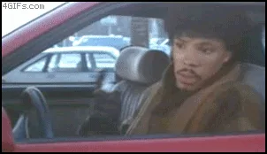A six-panel meme sequence shows a man in a red car wearing a hat and brown coat, transitioning from a confused, concerned…