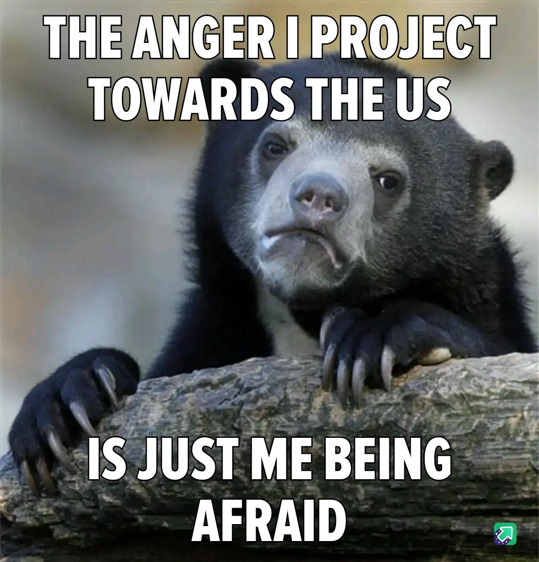 A close-up photo of a sad-looking, dark-furred bear with a downturned mouth, resting its paws on a log. The text overlaid in…