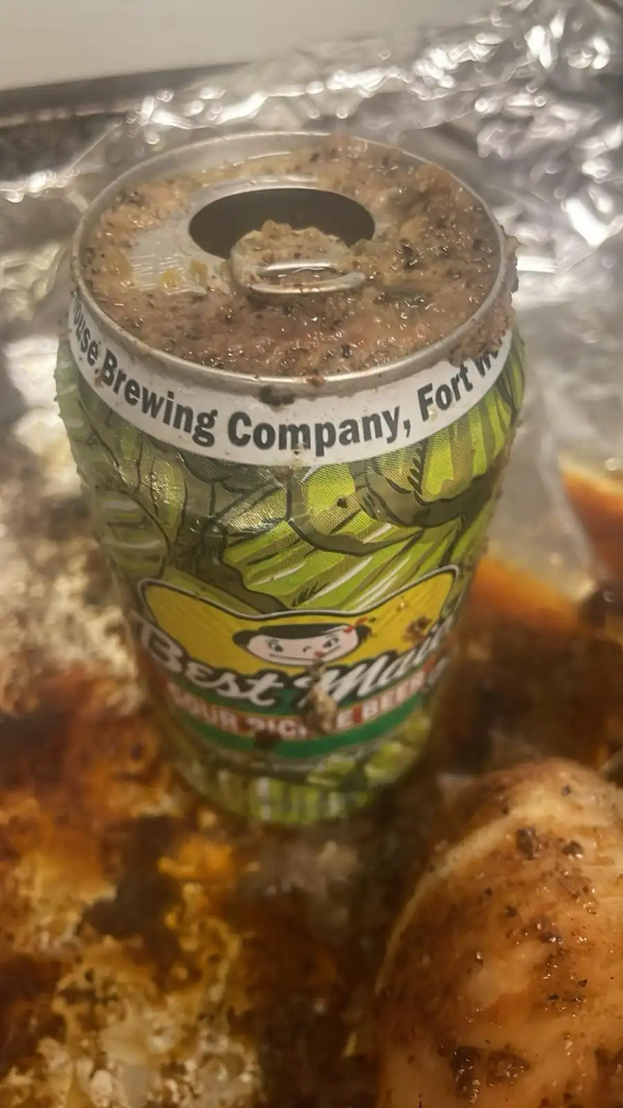 A close-up photo shows a green 'Best Mom' beer can, branded by 'House Brewing Company, Fort', sitting in a pan with aluminum…