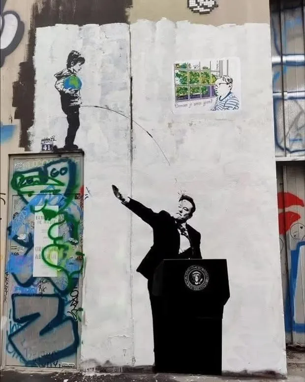 A street mural depicts a boy holding a globe and drawing a line toward a man in a suit at a podium with the presidential…