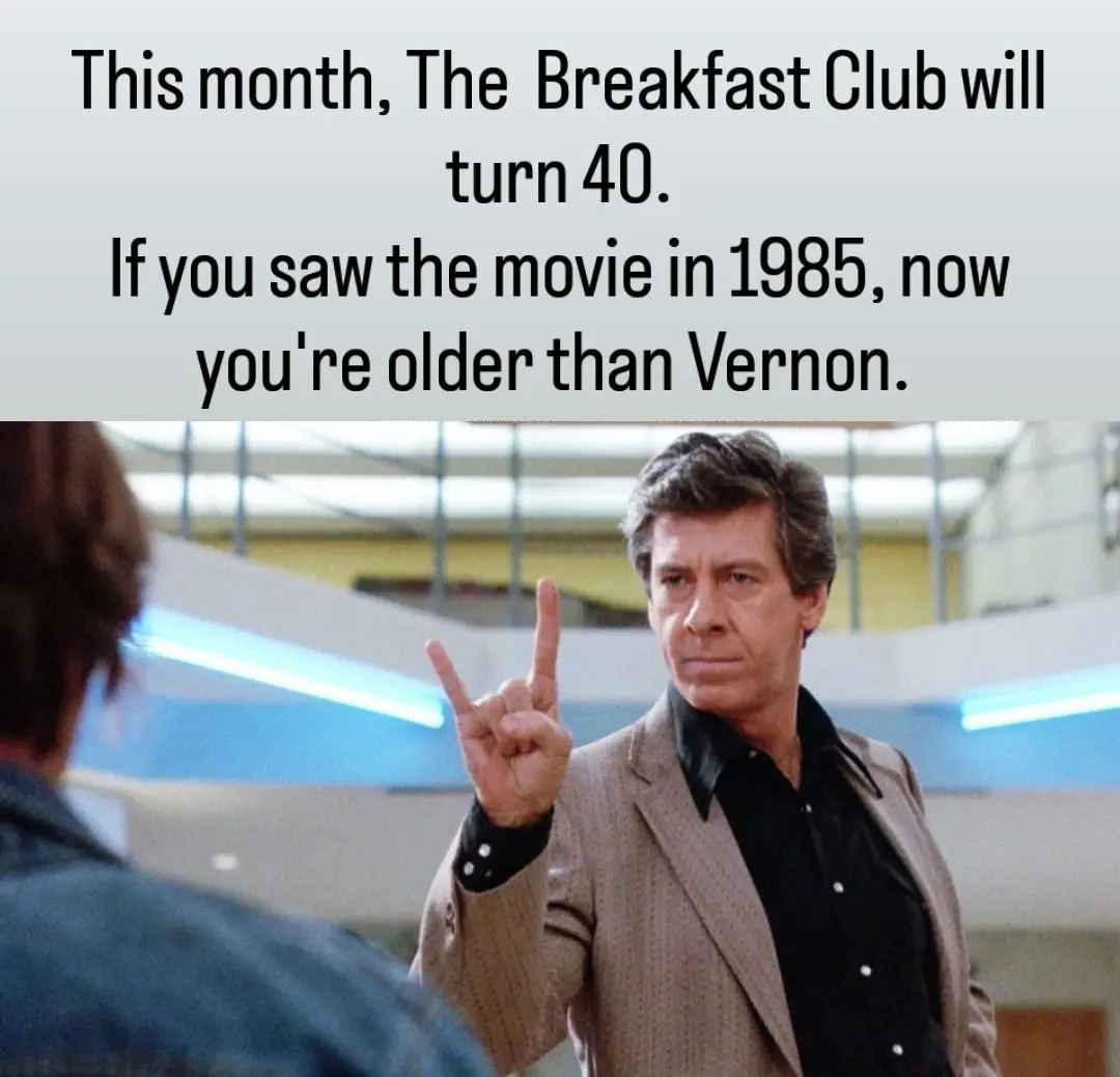 A still from the 1985 film 'The Breakfast Club' shows actor Judd Nelson as the character Vernon, making a peace sign with a…