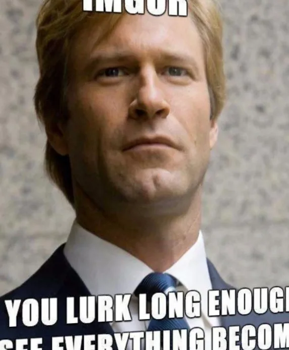 A close-up image of actor Aaron Eckhart, portraying his character from the movie 'The Dark Knight Rises', looking sternly at…