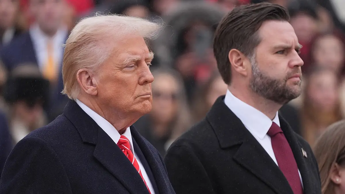 A side-by-side photo shows Donald Trump and a man with a beard, both in dark suits and ties, looking serious. Trump is on…