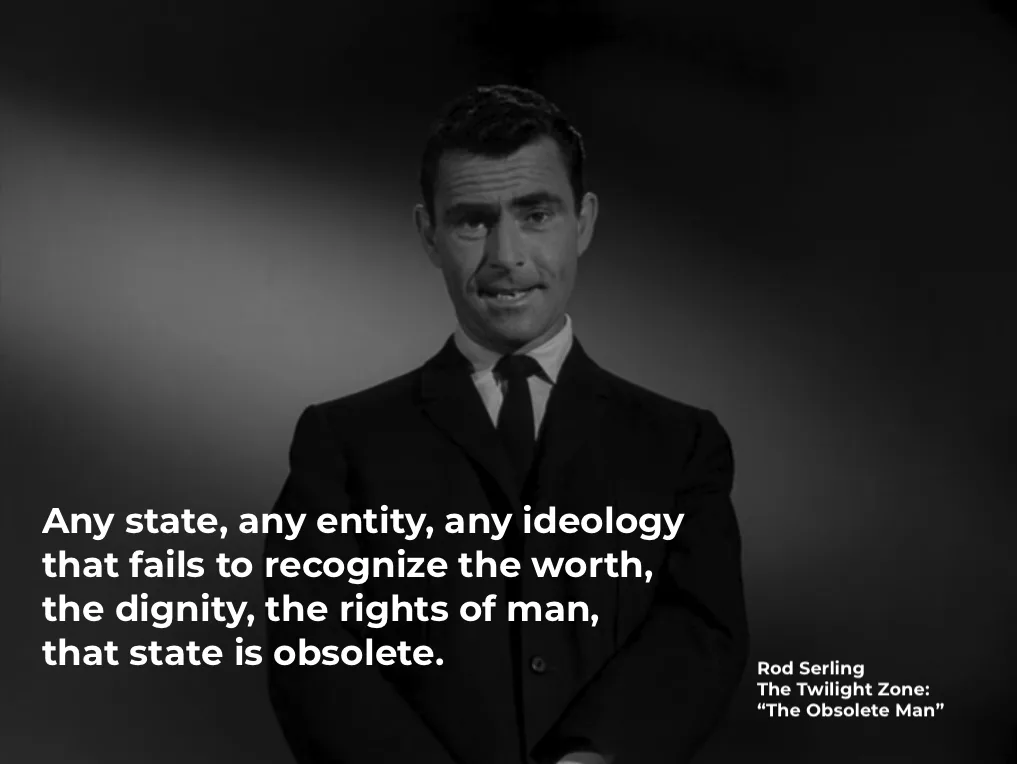 A black-and-white still of Rod Serling from The Twilight Zone episode "The Obsolete Man" shows him in a suit, looking…