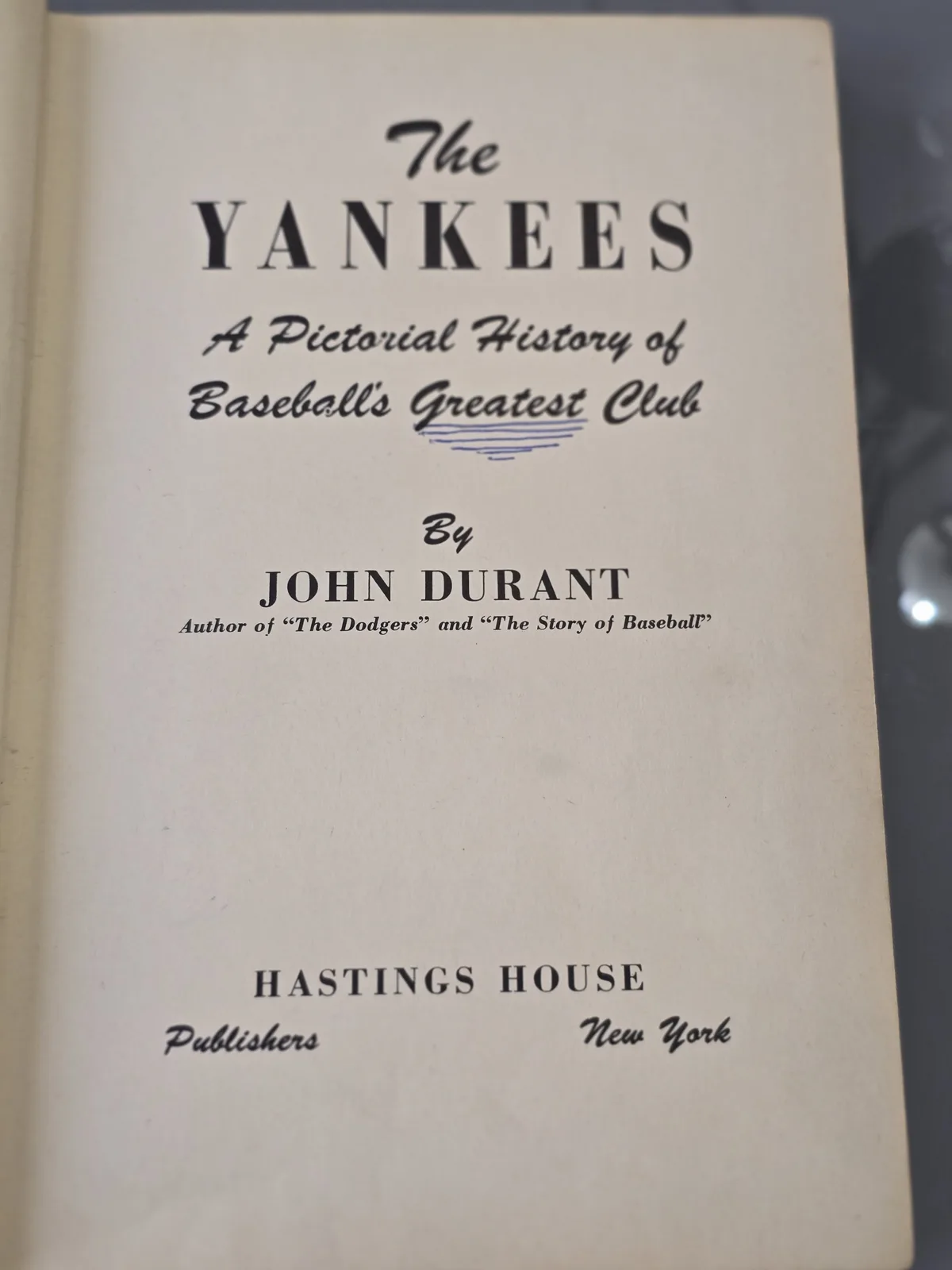 The image shows the title page of a book titled 'The Yankees: A Pictorial History of Baseball's Greatest Club' by John…