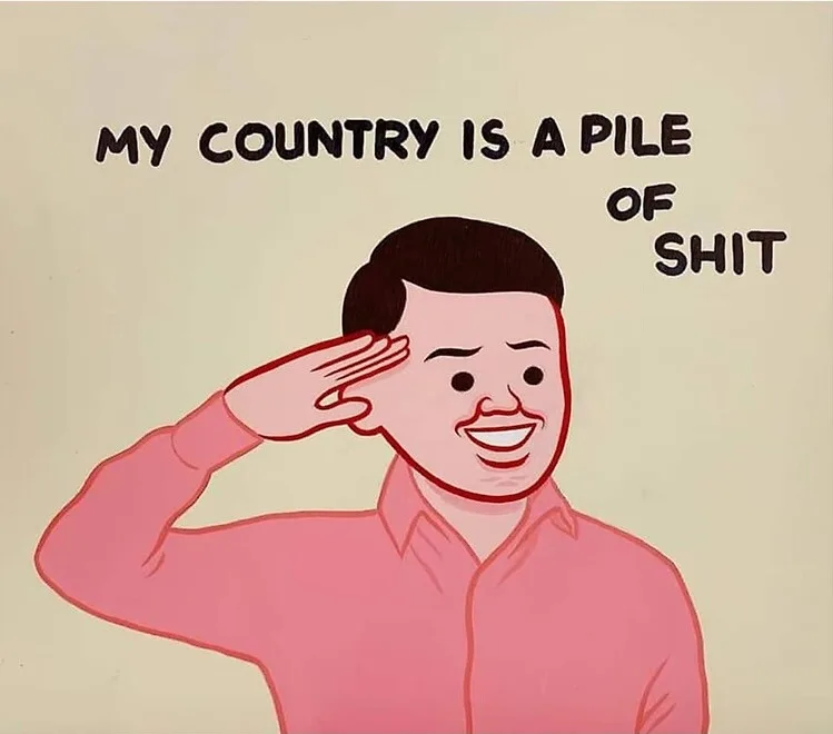 A cartoon drawing of a man in a pink shirt saluting with a wide, forced smile while the text 'MY COUNTRY IS A PILE OF SHIT'…