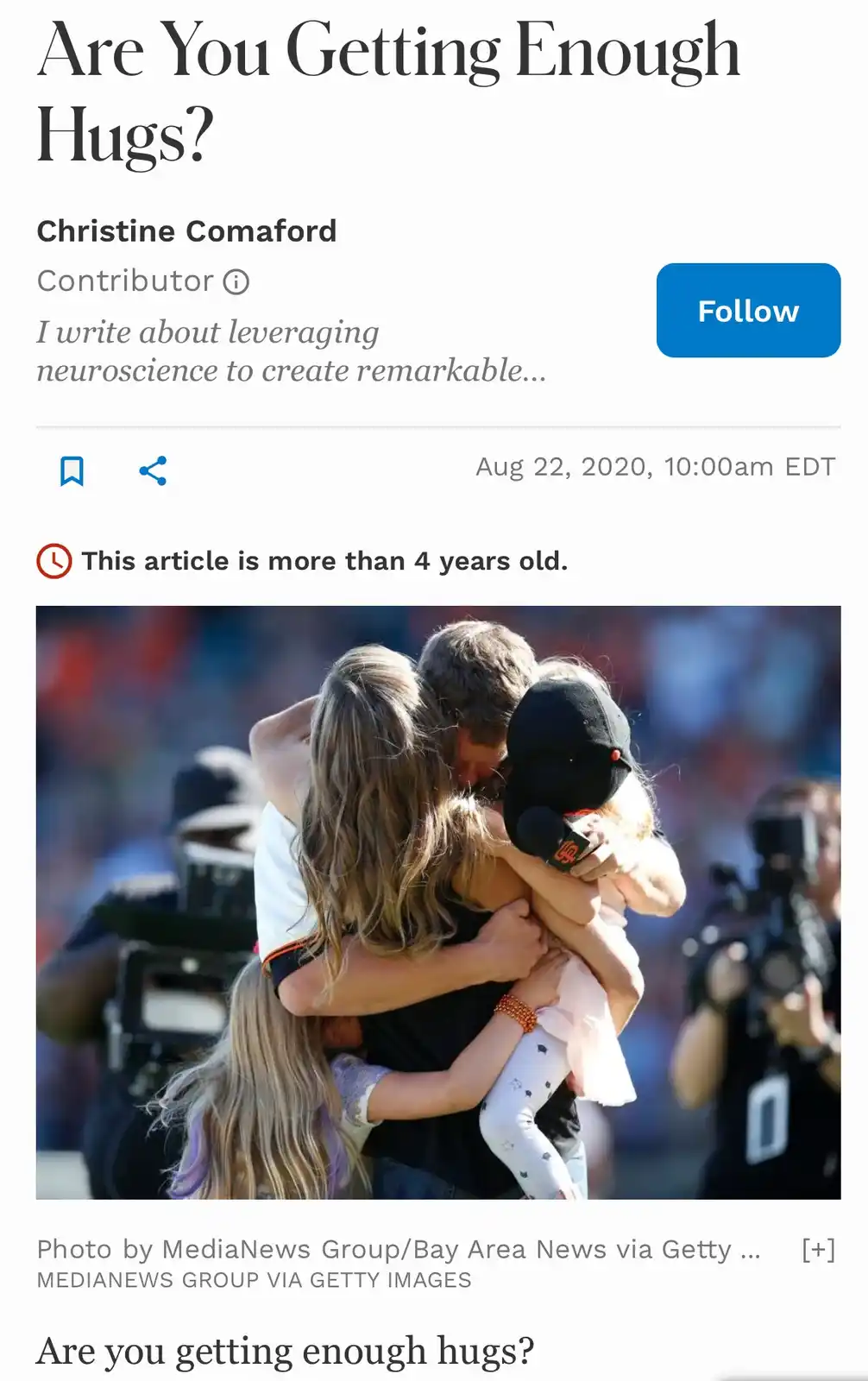 An article screenshot with the headline 'Are You Getting Enough Hugs?' by Christine Comaford, dated August 22, 2020. The…