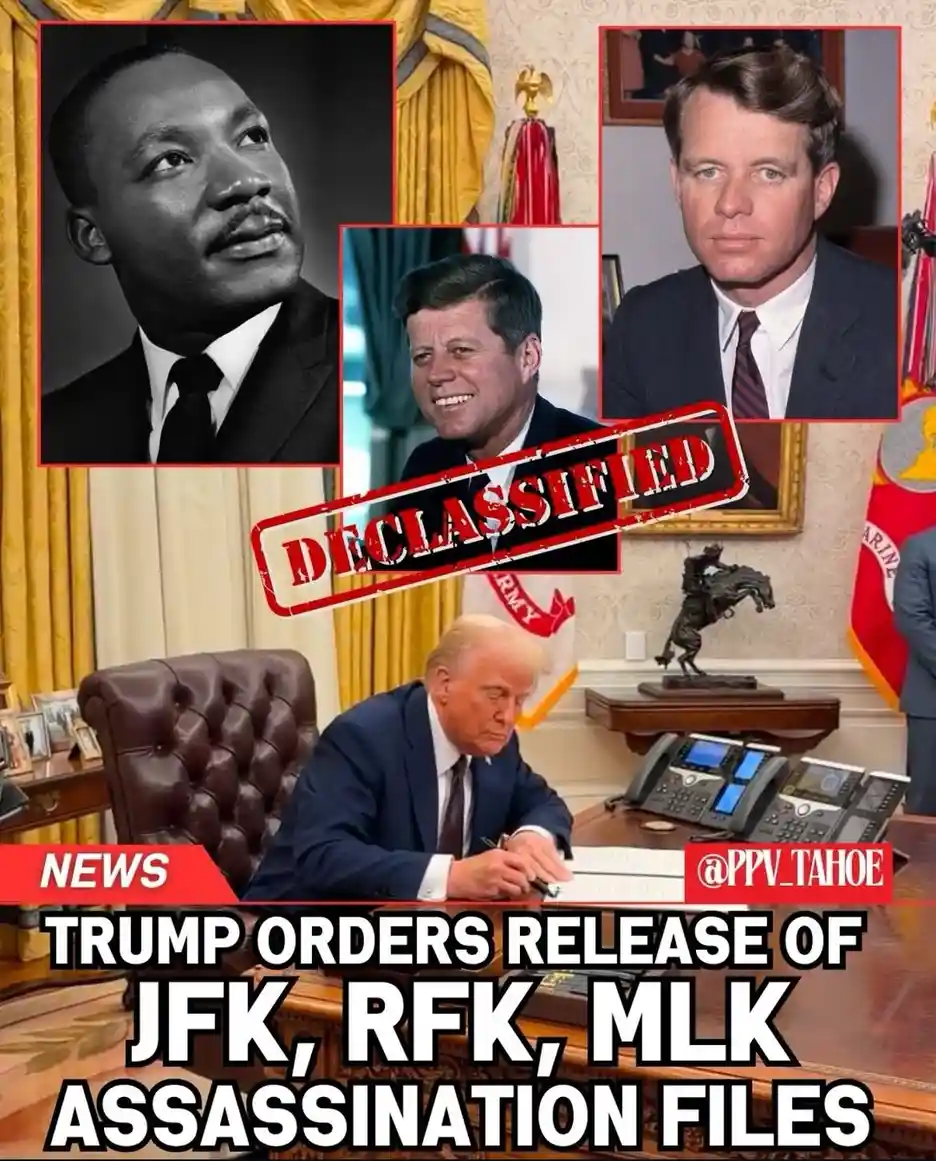 The image shows Donald Trump seated at a desk in an office, appearing to sign documents, with a large red 'DECLASSIFIED'…