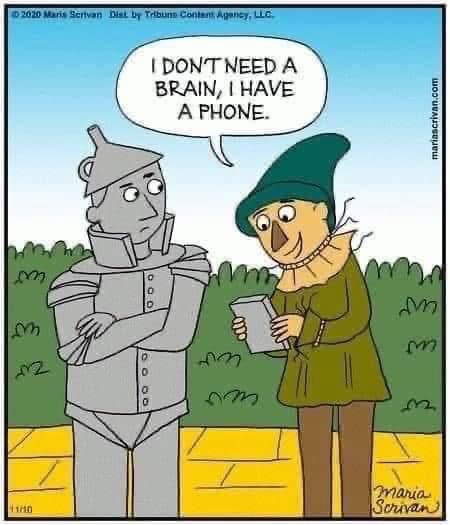 A cartoon depicts the Tin Man from The Wizard of Oz standing with arms crossed, while a woman in a green dress and hat holds…