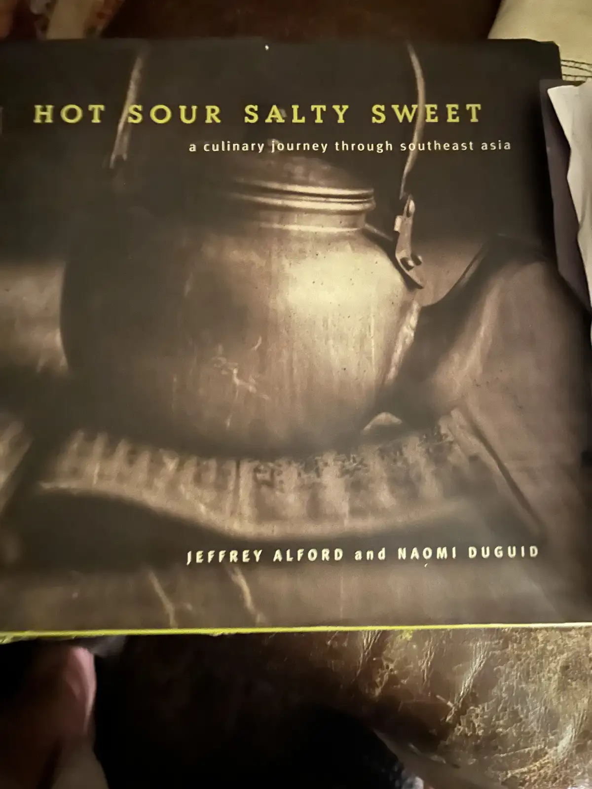 The image shows the cover of a cookbook titled 'HOT SOUR SALTY SWEET: a culinary journey through southeast asia' by Jeffrey…