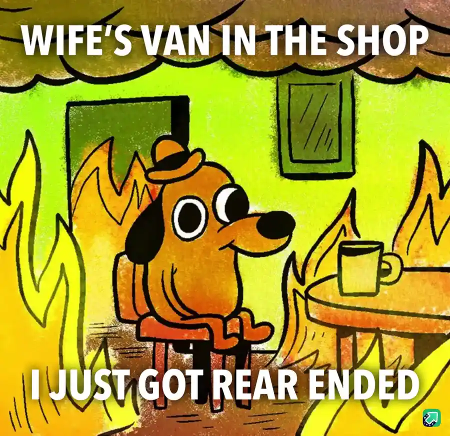 A cartoon dog wearing a hat sits calmly in a chair surrounded by flames, with a mug on a table nearby. The text at the top…