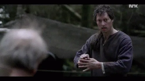 A split-screen image from a historical drama shows a man performing a hand gesture, followed by reactions from others. The…
