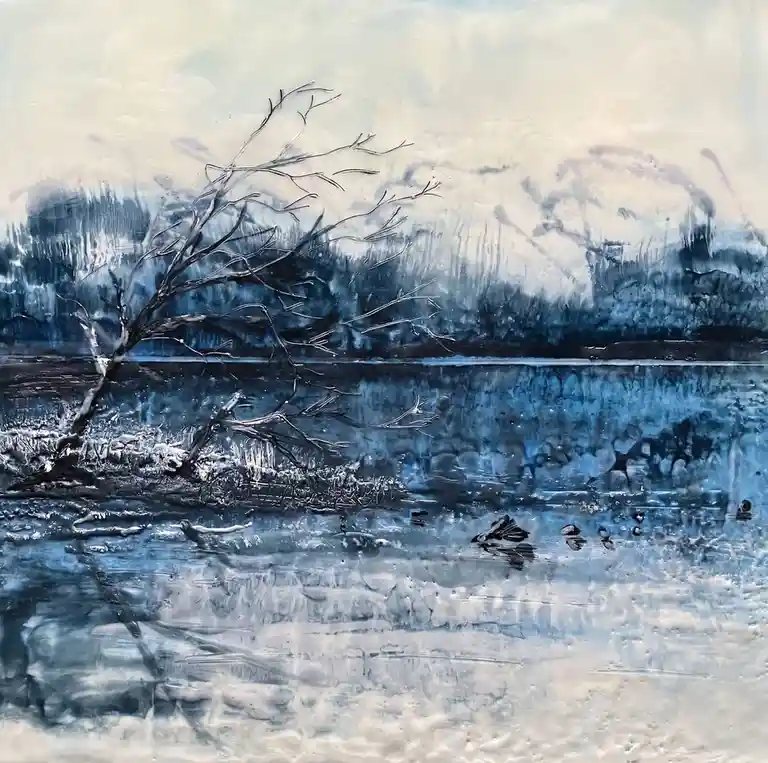 A moody, textured painting depicts a lone, leafless tree leaning over a frozen or icy body of water, with dark blue and gray…