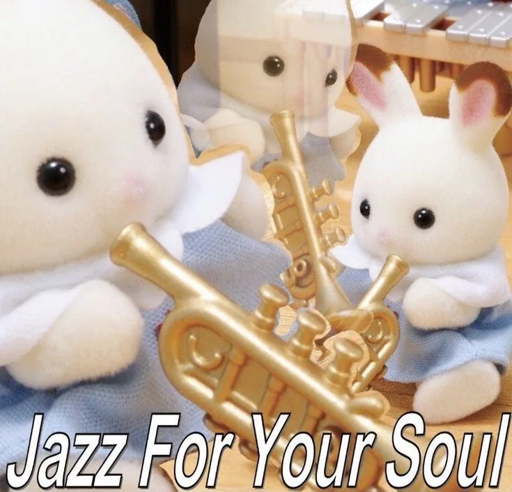 Three small, white, plush rabbit dolls dressed in light blue outfits are posed as if playing golden brass instruments…