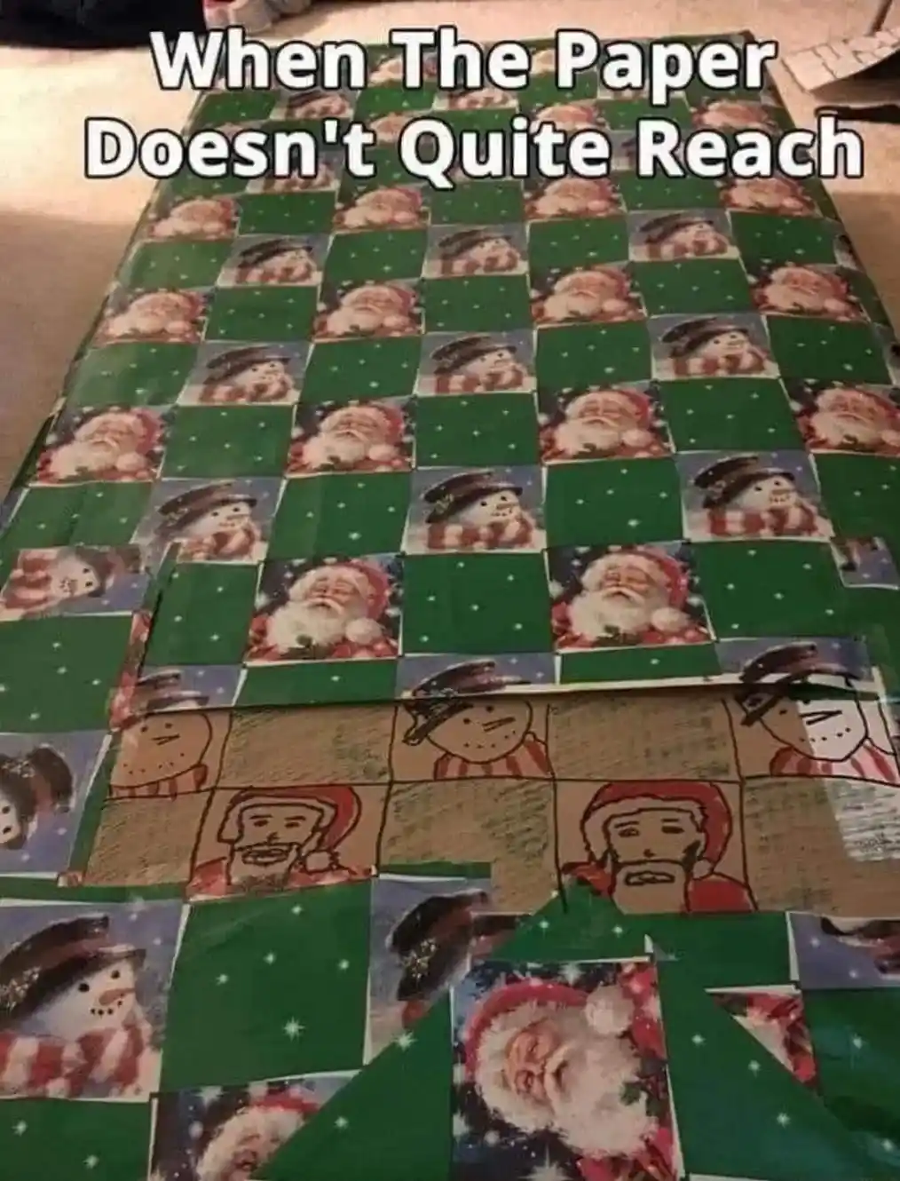 A Christmas-themed wrapping paper with repeating Santa and snowman images is laid out, but the paper is visibly torn or…