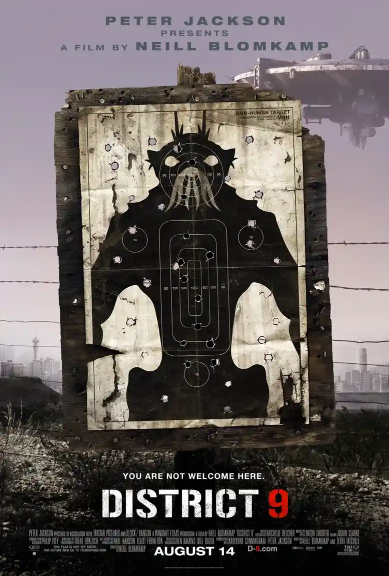 A movie poster for 'District 9' shows a weathered target board with a humanoid alien silhouette riddled with bullet holes…