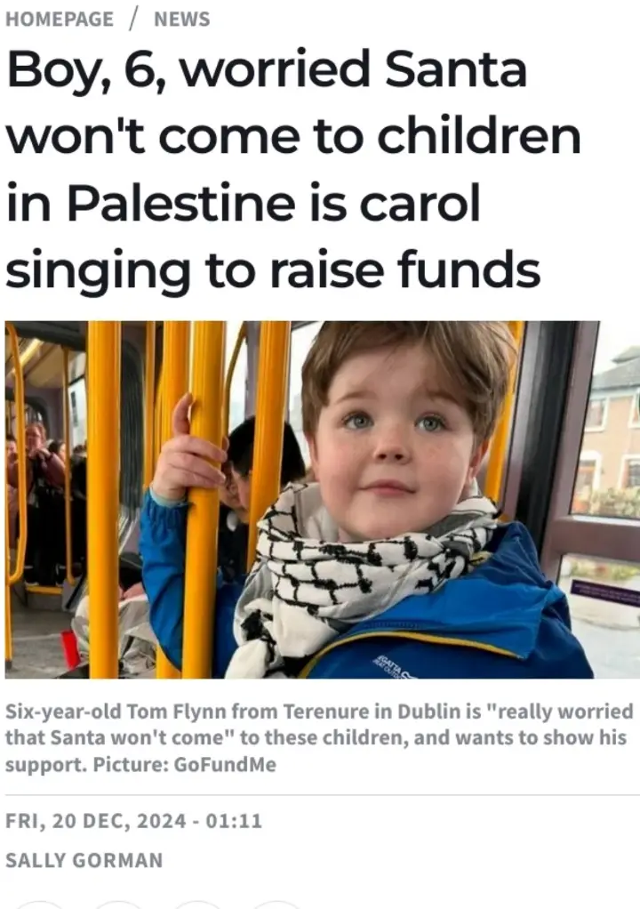 A screenshot of a news article shows a young boy with freckles and blue eyes, wearing a blue jacket and a black-and-white…