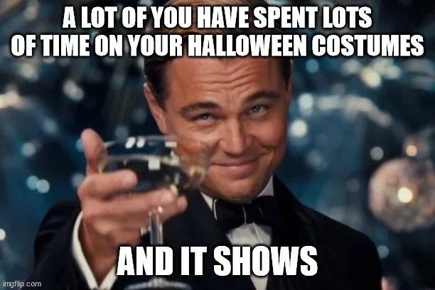 A man in a tuxedo holding a glass of champagne smiles smugly at the camera. White bold text overlaid at the top reads 'A LOT…