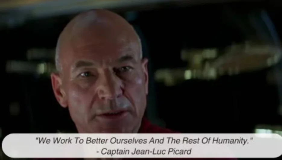 A close-up shot of Captain Jean-Luc Picard from Star Trek, looking serious and speaking. A white text bar at the bottom…