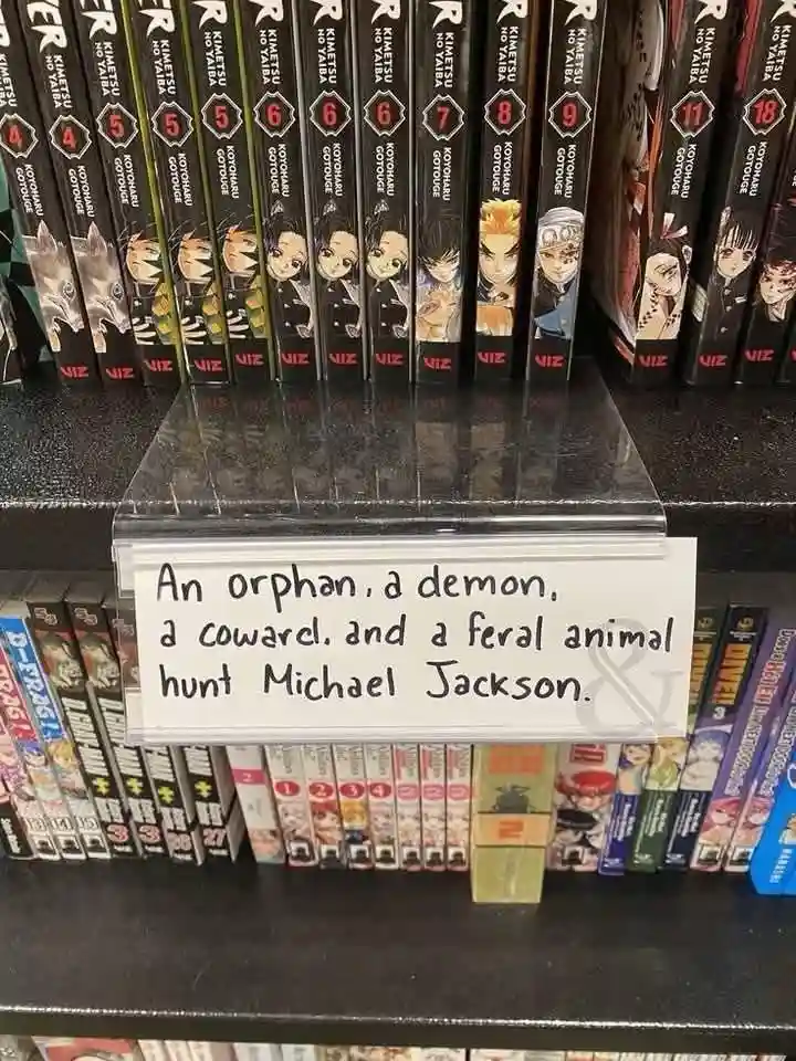 A handwritten note on a bookstore shelf reads 'An orphan, a demon, a coward, and a feral animal hunt Michael Jackson.'…