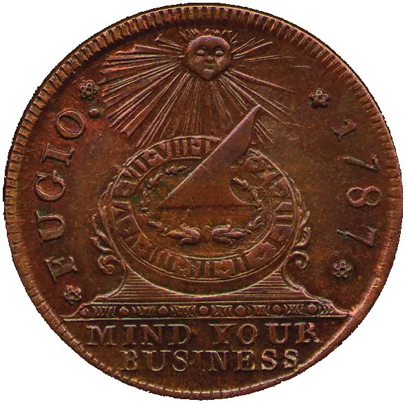A close-up of a copper-colored coin with a sun face above a sundial, the year 1787 along the rim, and the phrase 'MIND YOUR…
