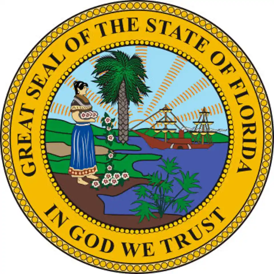 The image displays the official Great Seal of the State of Florida, featuring a Seminole woman holding flowers, a palm tree…