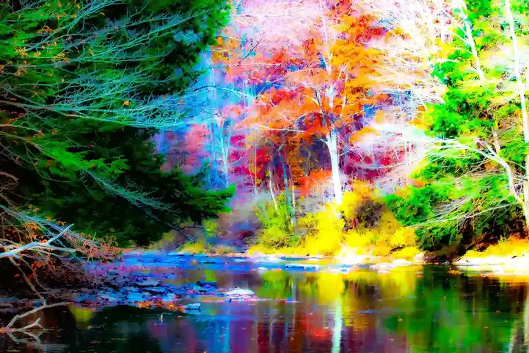 A heavily saturated and stylized image of a forest river scene with vibrant, unnatural colors—greens, blues, oranges, and…