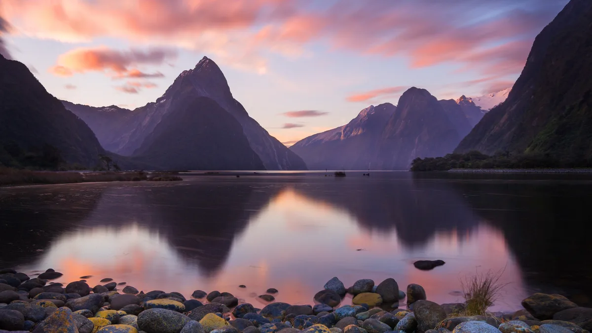 In New Zealand's remote Southern Hemisphere, a majestic 10-mile fjord holds a dual identity: Milford Sound / Piopiotahi…