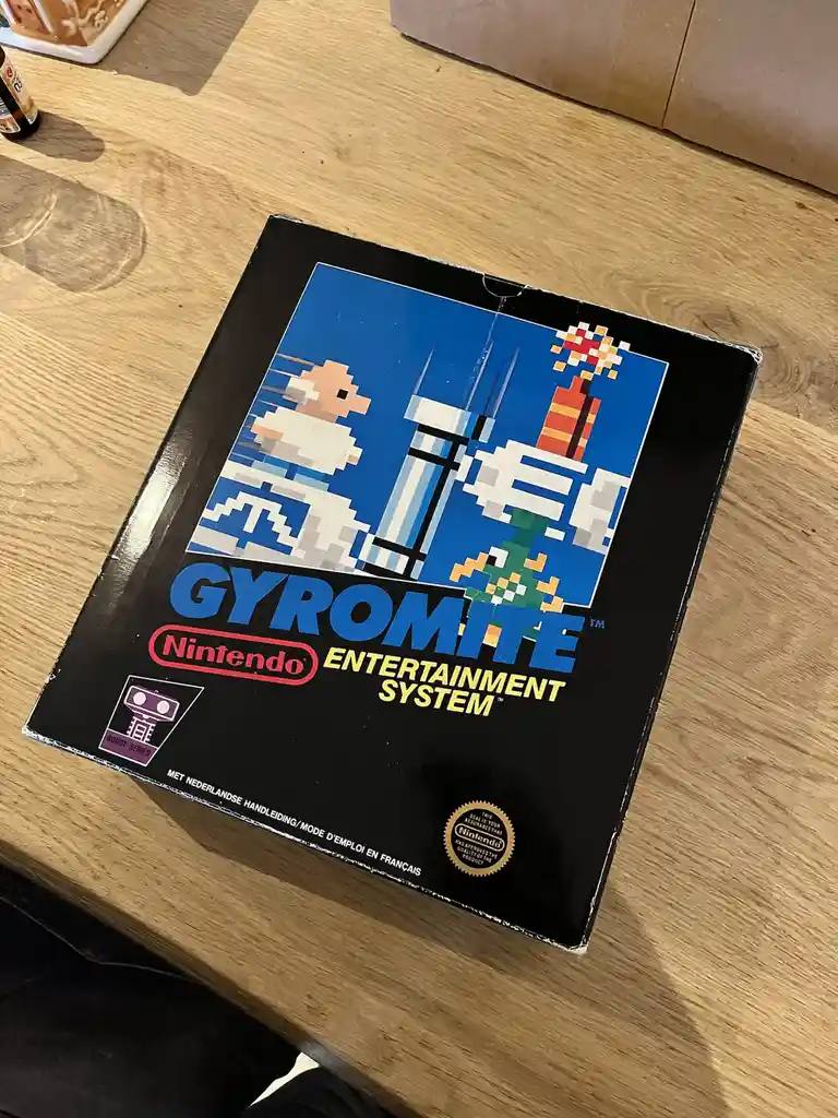 A black box resembling a Nintendo Entertainment System game case, but with the title 'GYROMITE' instead of 'Nintendo…