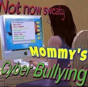 A person with long dark hair sits at a desk using an old iMac computer. The screen displays a chat window with messages like…