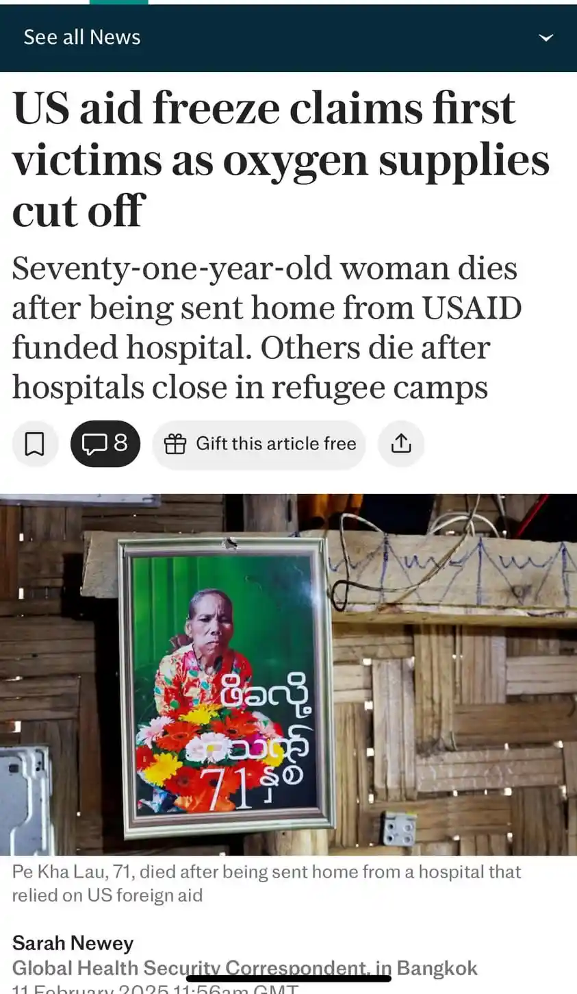 A screenshot of a news article with a headline about US aid cuts causing deaths in refugee camps, overlaid on a photo of a…