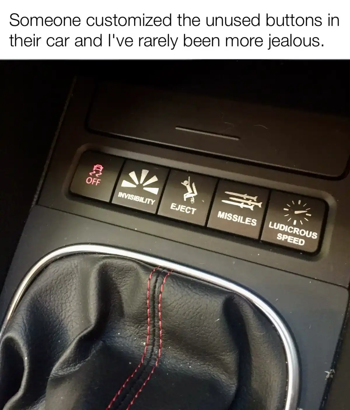 A close-up photo shows a car's center console with five custom-labeled buttons above a gear shift. The buttons are labeled…