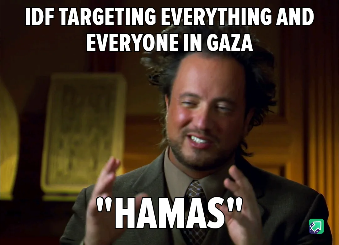 A man with messy dark hair, wearing a suit and tie, smiles while gesturing with both hands. The text at the top reads 'IDF…