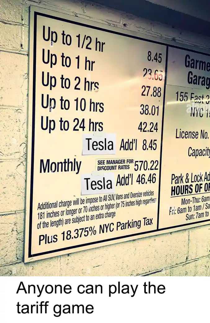 A parking garage rate sign shows standard hourly rates and a 'Tesla Add'l' fee of $8.45 for up to 1/2 hour and $46.46 for…