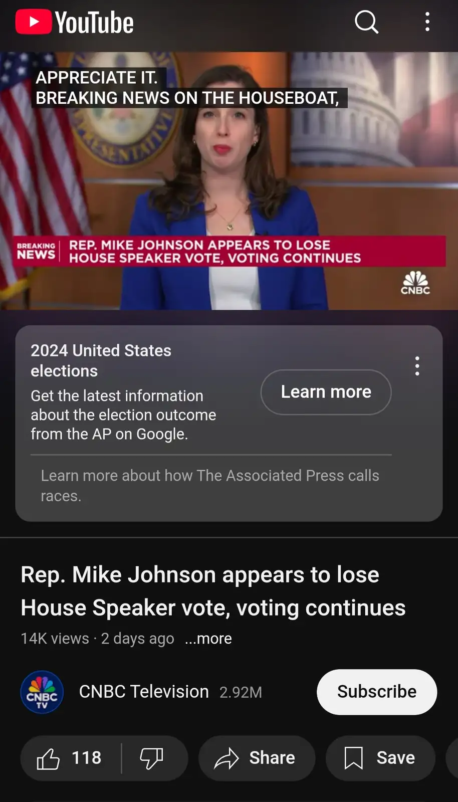 A screenshot of a YouTube video from CNBC showing a female news anchor in a blue blazer against a backdrop with an American…