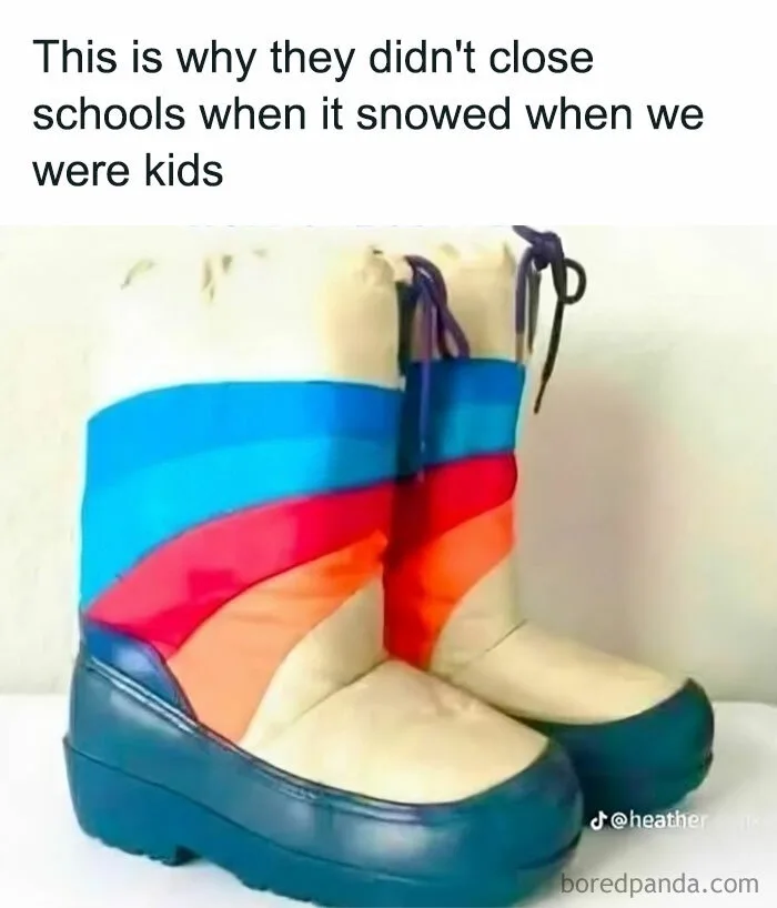 A pair of colorful, mismatched children's snow boots with blue, red, and orange stripes, beige uppers, and dark blue soles…